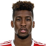 K. Coman